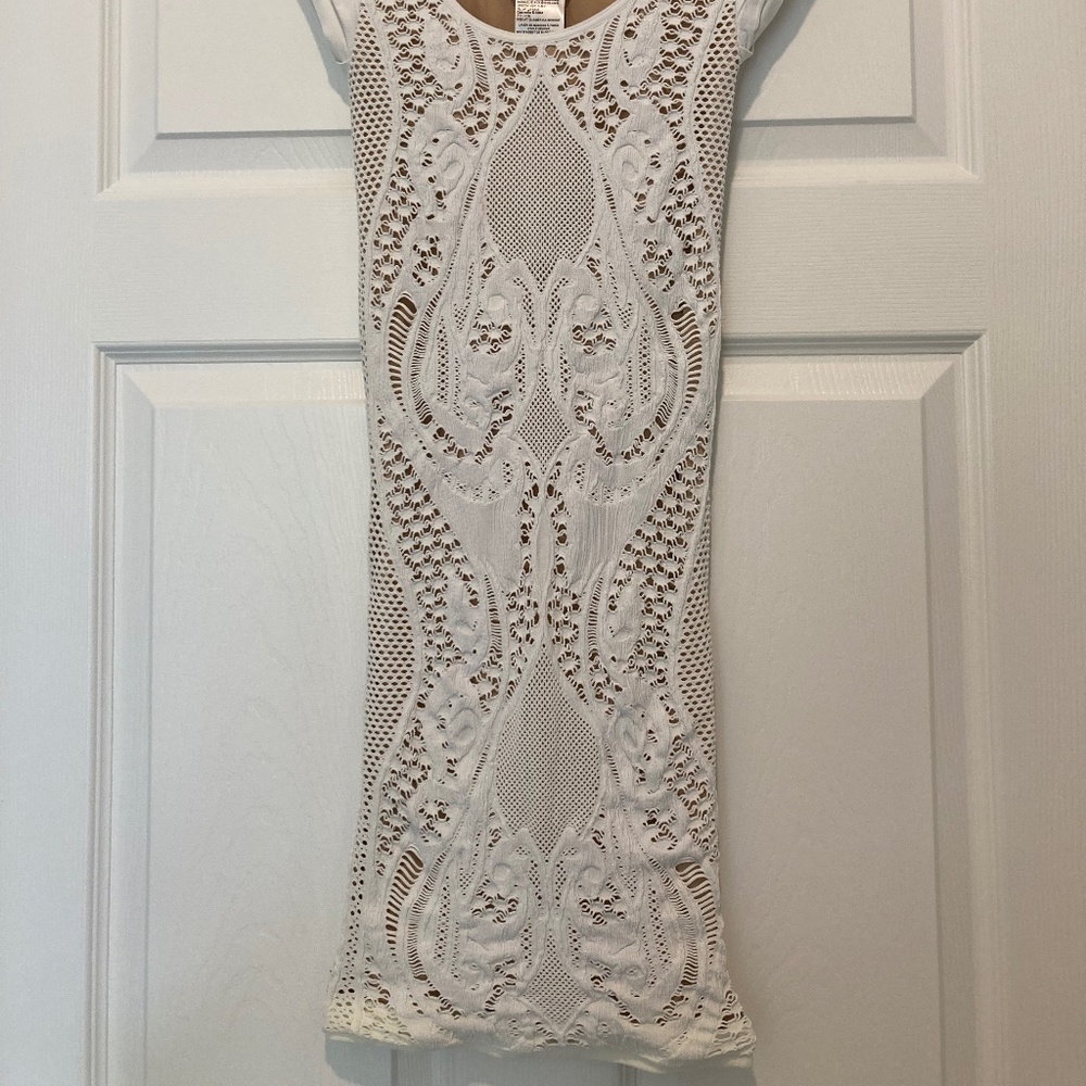 Yea Bebe white bandage dress Lacey with beige underneath materialm
